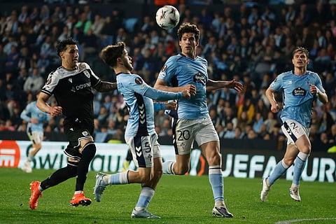 Celta's Sergio Carreira heads controls the ball during the second leg of the Europa League playoff soccer match between Celta Vigo and PAOK in Vigo, Spain.