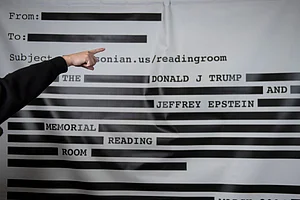 Cliff Owen : An "Epstein Reading Room" studio backdrop is set up at a rebuttal to President Donald Trump's State of the Union hosted by Defiance.org, the Portland Frog Brigade and COURIER at the National Press Club in Washington, Tuesday, Feb. 24, 2026
