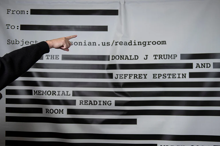 An "Epstein Reading Room" studio backdrop is set up at a rebuttal to President Donald Trump's State of the Union hosted by Defiance.org, the Portland Frog Brigade and COURIER at the National Press Club in Washington, Tuesday, Feb. 24, 2026 - Cliff Owen