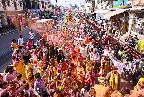 People take part in a religious procession on the occasion of 'Rangbhari Ekadashi', ahead of the Holi festival, in Ayodhya, Uttar Pradesh.