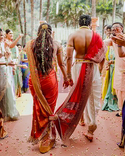 Actors Rashmika Mandanna and Vijay Deverakonda during their wedding ceremony, on the outskirts of Udaipur, Rajasthan. 