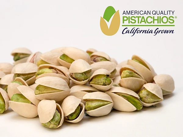Pile of California grown pistachios with logo