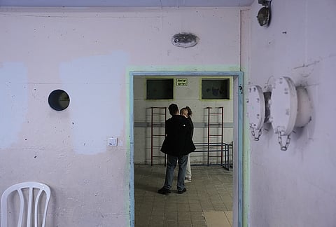 Civilians staying in a shelter after alarms announced that Israel had launched an attack on Iran, in Ramat Gan, Israel.