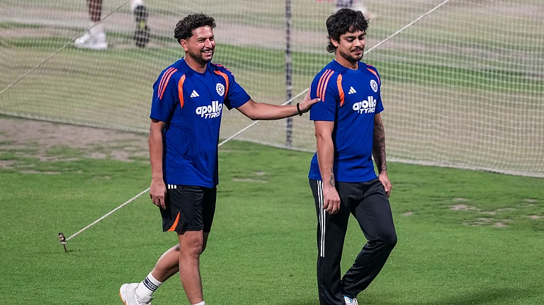 India's Kuldeep Yadav, left, and Ishan Kishan during a practice session ahead of their ICC T20 World Cup 2026 match against West Indies at the Eden Gardens in Kolkata. - PTI