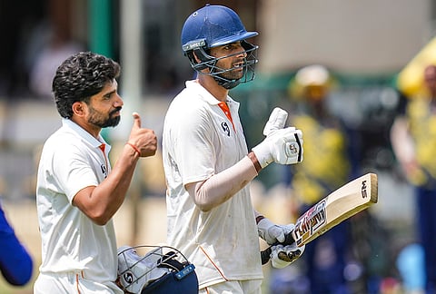 Jammu and Kashmir's Sahil Lotra and Qamran Iqbal return to the pavilion during lunch break on day five of the Ranji Trophy 2025-26 final cricket match between Karnataka and Jammu and Kashmir, at KSCA Cricket Stadium, in Hubballi, Dharwad district.