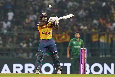 Sri Lanka's Charith Asalanka plays a shot during the T20 World Cup cricket match between Pakistan and Sri Lanka in Pallekele, Sri Lanka.