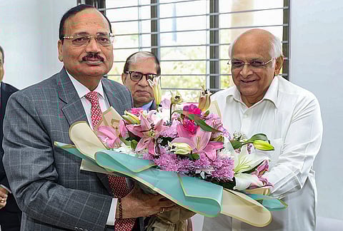 Gujarat Chief Minister Bhupendra Patel with Chief Justice of India Surya Kant during a meeting, in Gujarat. 