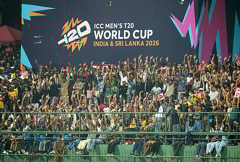 Spectators cheer on their teams during the T20 World Cup cricket match between Pakistan and Sri Lanka in Pallekele, Sri Lanka.