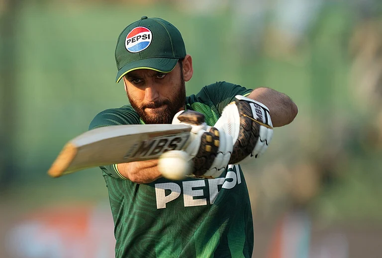 Pakistan's captain Salman Ali Agha warms up before the start of the T20 World Cup cricket match between Pakistan and Sri Lanka in Pallekele, Sri Lanka. - | Photo: AP/Eranga Jayawardena