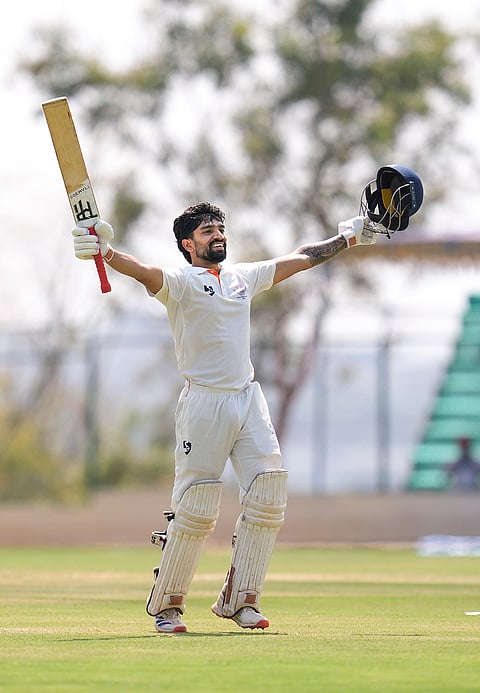 Jammu and Kashmir's Sahil Lotra celebrates his century during the fifth day of the Ranji Trophy 2025-26 final cricket match between Jammu and Kashmir and Karnataka, at KSCA Stadium, in Hubballi, Karnataka.