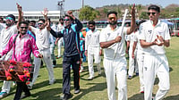 PTI/Shailendra Bhojak : Jammu and Kashmir's Auqib Nabi with teammates celebrates the team's victory in the Ranji Trophy 2025-26 final against Karnataka, at KSCA Stadium in Hubballi.