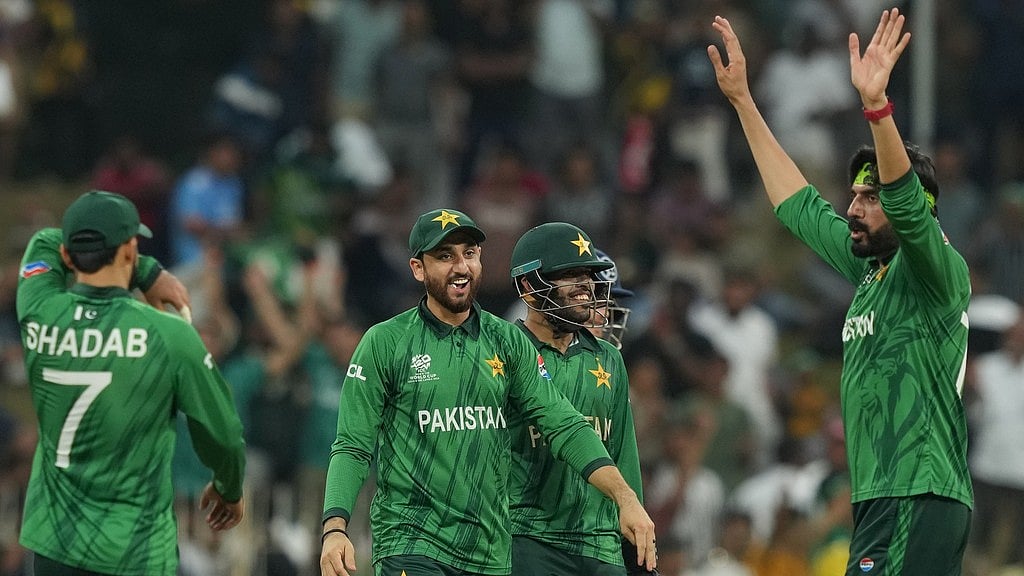 Pakistan's captain Salman Ali Agha, centre, celebrates with teammates after winning the T20 World Cup match against Namibia in Colombo. - Photo: AP
