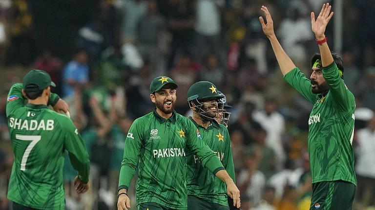 Pakistan's captain Salman Ali Agha, centre, celebrates with teammates after winning the T20 World Cup match against Namibia in Colombo. - Photo: AP