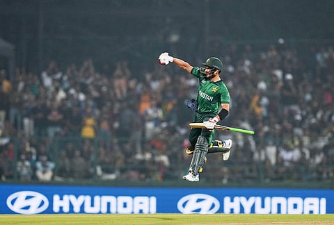 Pakistan's Sahibzada Farhan celebrates his century during the T20 World Cup cricket match between Pakistan and Sri Lanka in Pallekele, Sri Lanka.