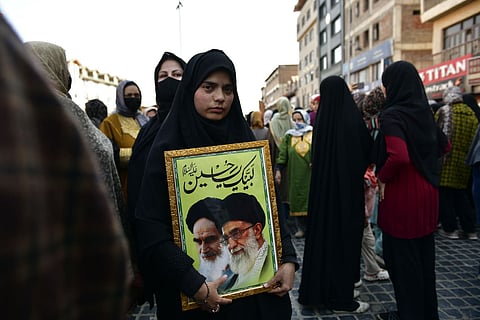 People take part in a protest against the alleged killing of Iranian Supreme Leader Ayatollah Ali Khamenei in a reported US-Israel strike, in Srinagar.
