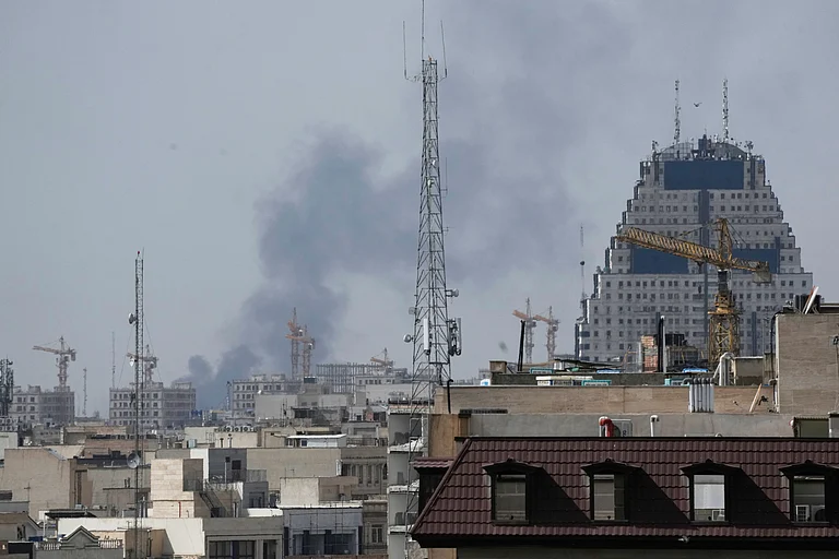 Smoke rises on the skyline after an explosion in Tehran, Iran, Saturday, Feb. 28, 2026. - AP Photo