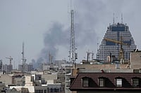 AP Photo : Smoke rises on the skyline after an explosion in Tehran, Iran, Saturday, Feb. 28, 2026.