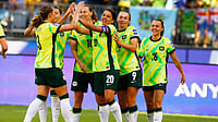 Australia 1-0 Philippines, AFC Women’s Asian Cup 2026: Sam Kerr Header Secures Opening Win | Photo: AP/Gary Day : Australia's Sam Kerr, centre, is congratulated by teammates after scoring her team's first goal during the Women's Asia Cup soccer match between Australia and the Philippines in Perth, Australia, Sunday, March 1, 2026.