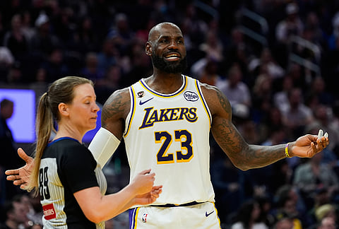 Los Angeles Lakers forward LeBron James (23) reacts during the second half of an NBA basketball game against the Golden State Warriors in San Francisco.
