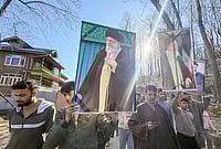 | Photo: PTI : People hold a portrait of Iran's Supreme Leader Ayatollah Ali Khamenei during a protest following his alleged killing in a US-Israel strike, in Kulgam.