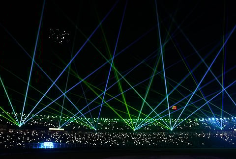 A laser show entertains the spectators during a drinks break of the T20 World Cup cricket match between India and West Indies in Kolkata.