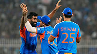 When Is India’s T20 World Cup 2026 Semifinal? Date and Opponent Details | Photo: AP/Bikas Das : India's Jasprit Bumrah, left, celebrates with captain Suryakumar Yadav the wicket of West Indies' Roston Chase during the T20 World Cup cricket match between India and West Indies in Kolkata.