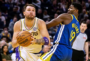 | Photo: Stephen Lam/San Francisco Chronicle via AP : Los Angeles Lakers guard Luka Doncic (77) drives past Golden State Warriors guard Nate Williams (19) during the third quarter of their NBA basketball game in San Francisco.