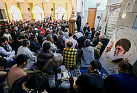 | Photo: PTI : People offer prayers following the alleged killing of Iran's Supreme Leader Ayatollah Ali Khamenei in a US-Israel strike, at a mosque, in Jammu. Iran confirmed Khamenei's death after airstrikes targeted his compound in Tehran. 