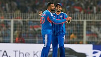 | Photo: AP/Bikas Das : India's Varun Chakravarthy, left, and captain Suryakumar Yadav celebrate the wicket of West Indies' captain Shai Hope during the T20 World Cup cricket match between India and West Indies in Kolkata.