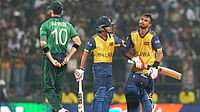 Eranga Jayawardena : Sri Lanka's captain Dasun Shanaka, right, is consoled by teammate Dunith Wellalage after losing the T20 World Cup cricket match against Pakistan in Pallekele, Sri Lanka.