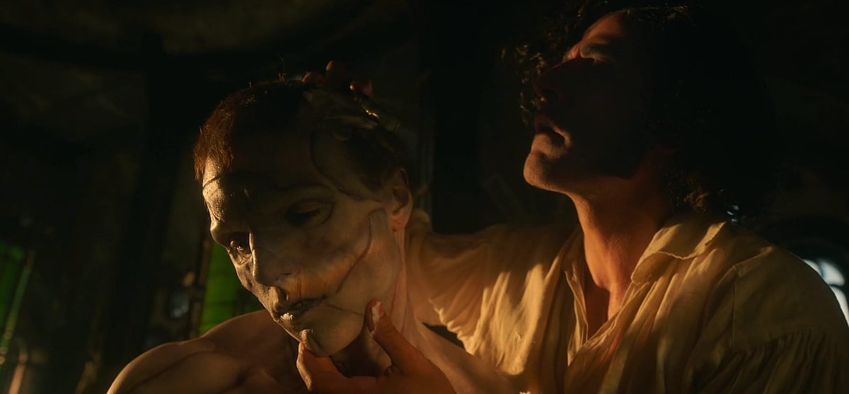 A still from Guillermo Del Toro's Frankenstein (2025) featuring the Creature and Victor Frankenstein 
Source: - IMDB