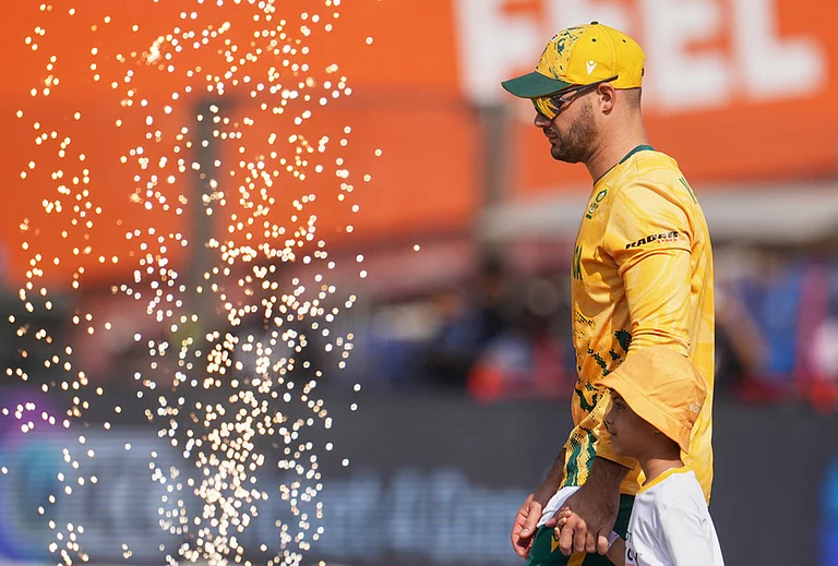 South Africa's captain Aiden Markram arrives in the field for their national anthem before the start of the T20 World Cup cricket match between South Africa and Zimbabwe in New Delhi. - | Photo: AP/Manish Swarup