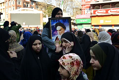 People take part in a protest against the alleged killing of Iranian Supreme Leader Ayatollah Ali Khamenei in a reported US-Israel strike, in Srinagar.