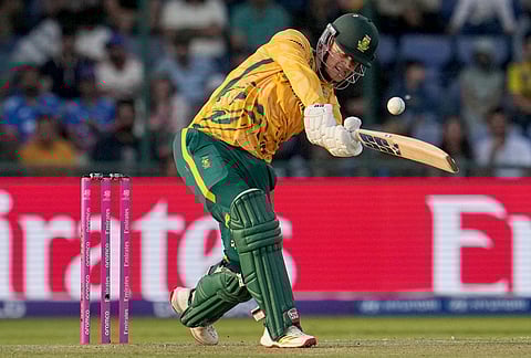 South Africa's Ryan Rickelton hits a six during the T20 World Cup cricket match between South Africa and Zimbabwe in New Delhi.