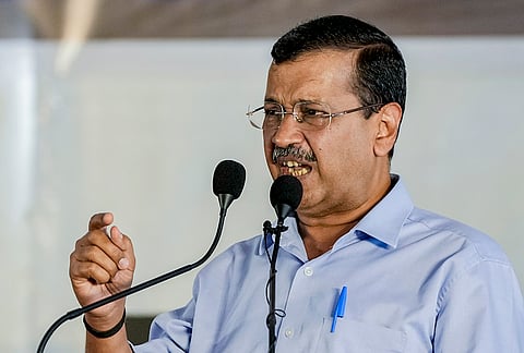 AAP national convener Arvind Kejriwal addresses the gathering during a rally, at Jantar Mantar, in New Delhi.