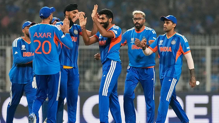 India's Jasprit Bumrah, centre, celebrates with teammates the wicket of West Indies' Shimron Hetmyer during the T20 World Cup cricket match between India and West Indies in Kolkata. - Photo: AP