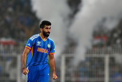 India's Jasprit Bumrah celebrates the wicket of West Indies' Roston Chase during the T20 World Cup cricket match between India and West Indies in Kolkata.