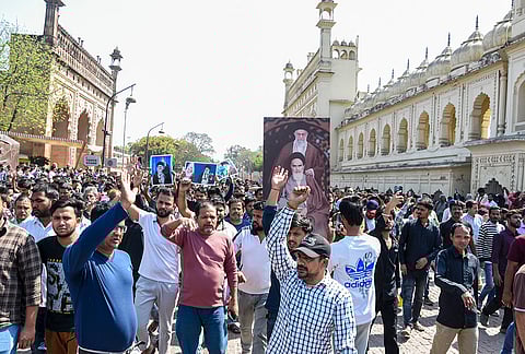 People from the Muslim community shout slogans during a protest against the alleged killing of Iranian Supreme Leader Ayatollah Ali Khamenei in a reported US-Israel strike, near Bara Imambara, in Lucknow.