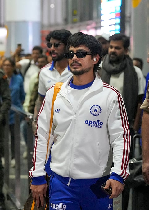 India's Ishan Kishan leaves from the airport after the team's arrival for the ICC Men's T20 World Cup 2026 cricket match against West Indies, in Kolkata.
