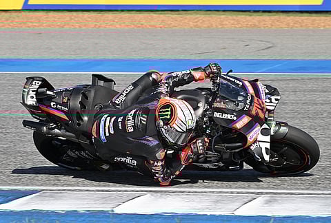 Italy's Marco Bezzecchi of Aprilia Racing steers his motorcycle during the MotoGP at the Chang International Circuit in Buriram, Thailand.