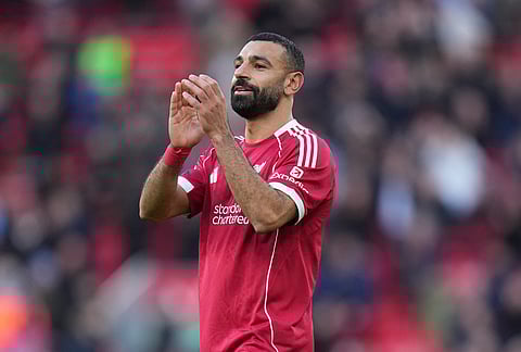 Liverpool's Mohamed Salah walks off the pitch after the Premier League soccer match between Liverpool and West Ham United in Liverpool, England.