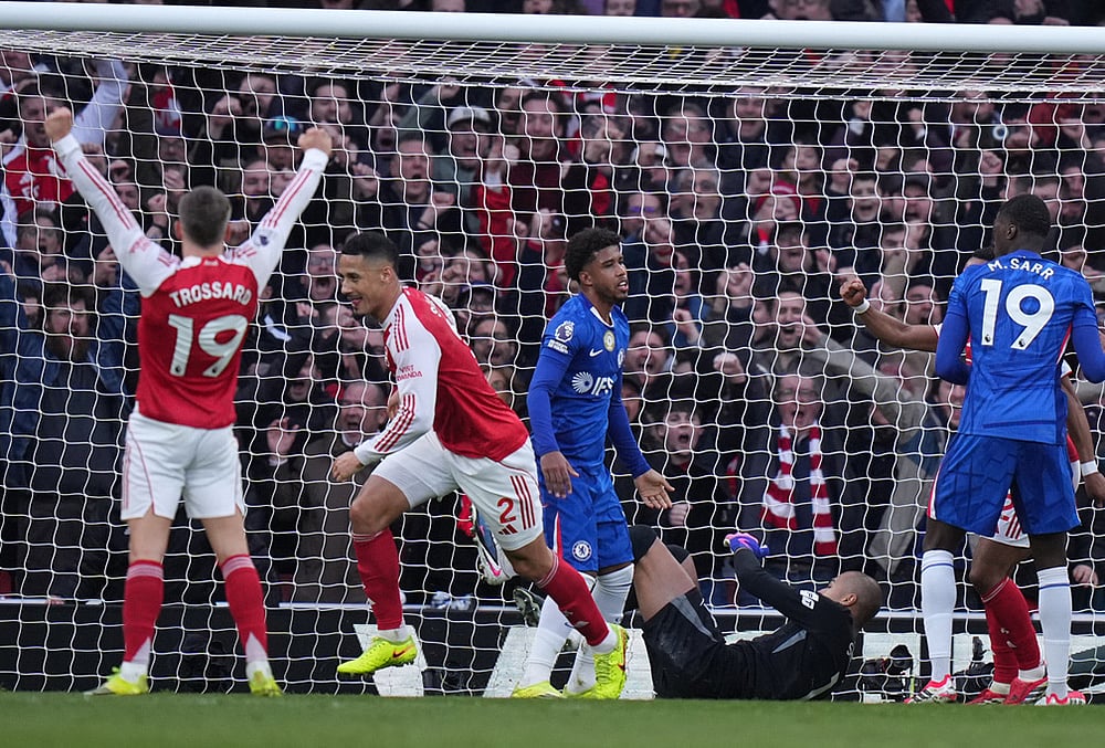 Arsenal's Leandro Trossard and William Saliba celebrates after a goal during the Premier League soccer match between Chelsea Arsenal in London. - | Photo: AP/Alastair Grant