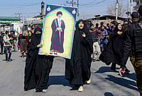 | Photo: PTI  : People stage a protest over the killing of Iran's Supreme Leader Ayatollah Ali Khamenei in joint air strikes by the US and Israel, amid severe restrictions on the movement of people in parts of Kashmir, Srinagar.