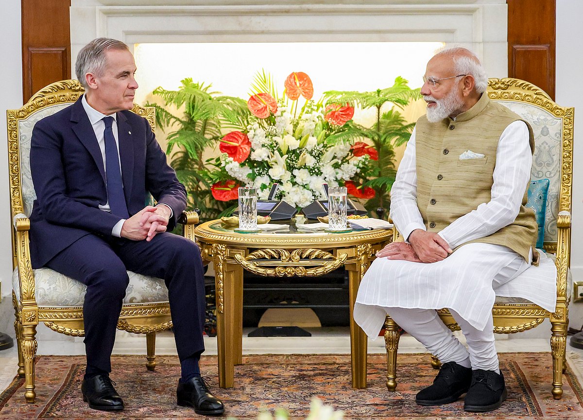 PM Modi with PM Carney - null