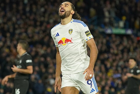 Leeds' Dominic Calvert-Lewin reacts during the Premier League soccer match between Leeds United and Manchester City in Leeds, England.