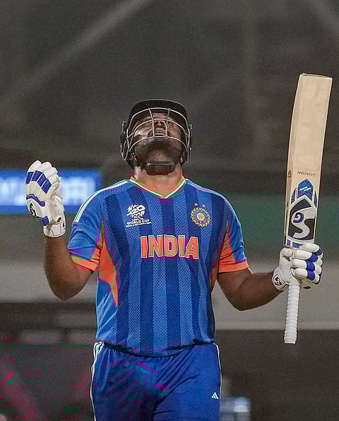 India's Sanju Samson celebrates his half century during the ICC Men's T20 World Cup 2026 cricket match between India and West Indies, at the Eden Gardens, in Kolkata, West Bengal.