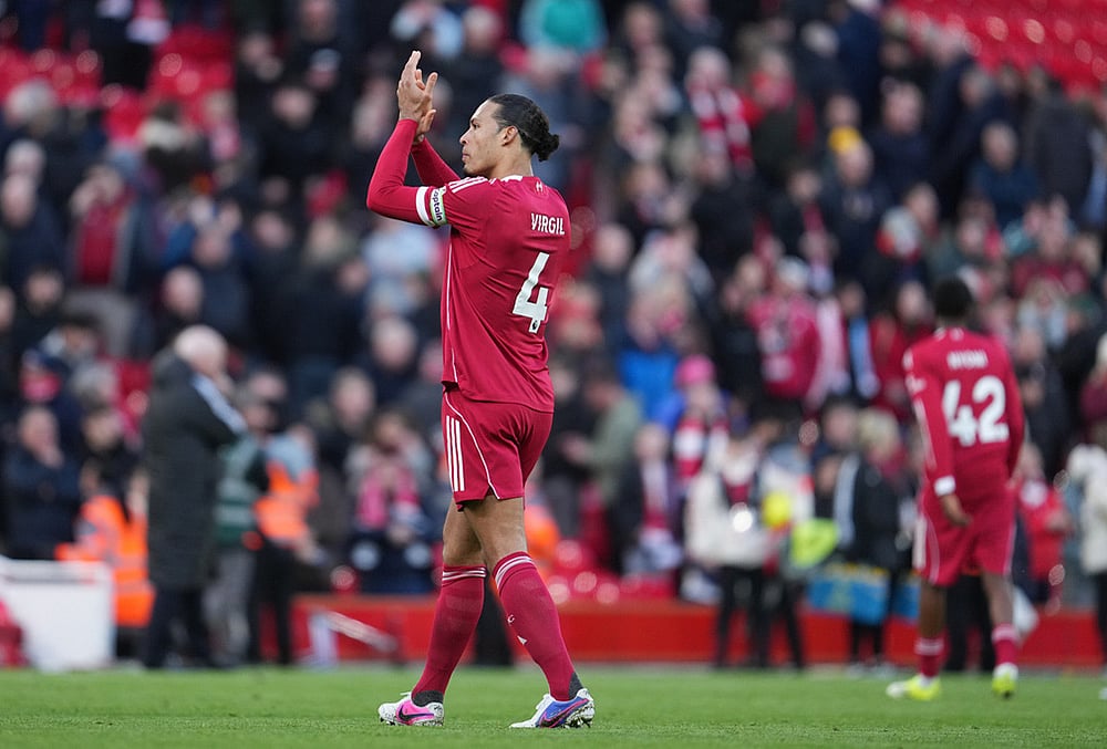 Liverpool's Virgil van Dijk walks off the pitch after the Premier League soccer match between Liverpool and West Ham United in Liverpool, England. - | Photo: AP/Jon Super