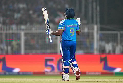 India's Sanju Samson celebrates his fifty runs during the T20 World Cup cricket match between India and West Indies in Kolkata.