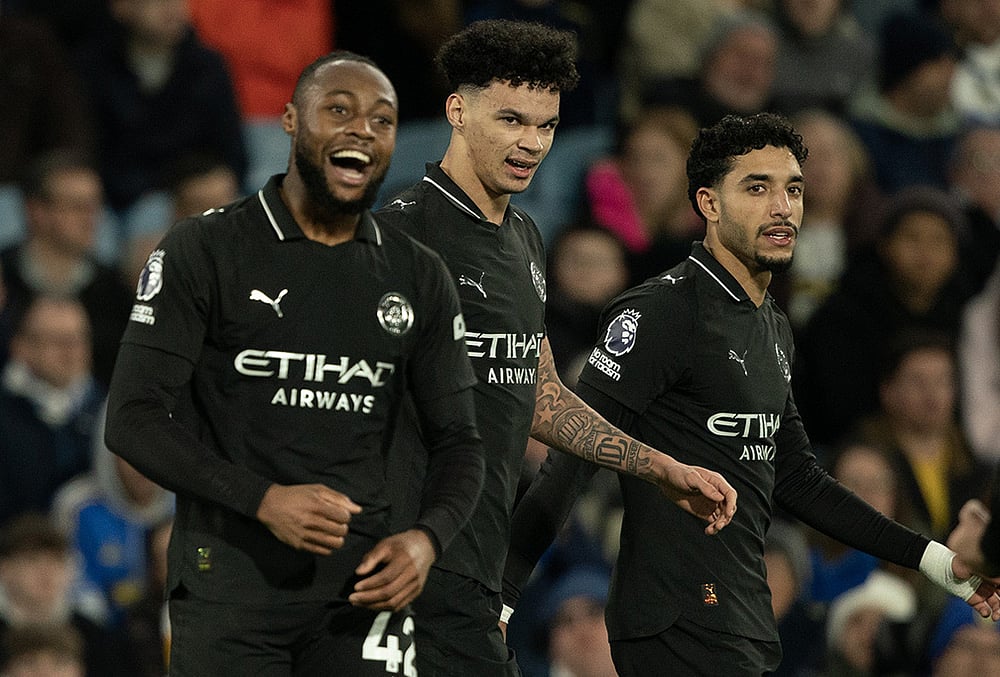 Manchester City's Antoine Semenyo, left, reacts after scoring during the Premier League soccer match between Leeds United and Manchester City in Leeds, England. - | Photo: AP/Ian Hodgson