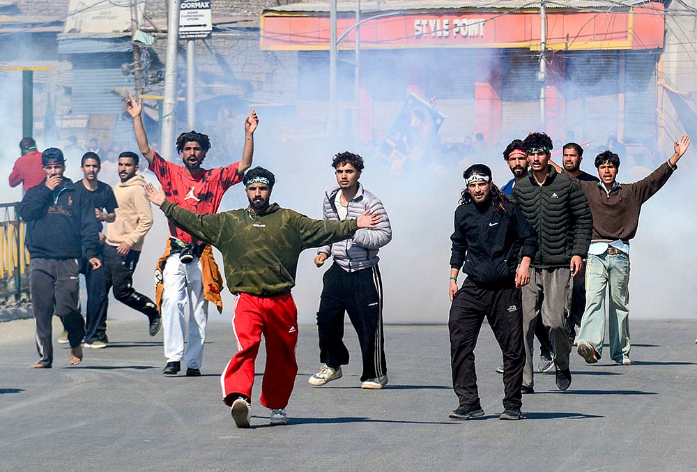 People stage a protest against the alleged killing of Iran's Supreme Leader Ayatollah Ali Khamenei in a US-Israel strike, amid severe restrictions on the movement of people in parts of Kashmir, Srinagar. - | Photo: PTI